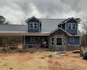 Soffit, Fascia, and Gutters: Aluminum color white 
Siding: Vinyl variform 
             Color Bayou Blue
 Ceilings: Corrugated Tin
