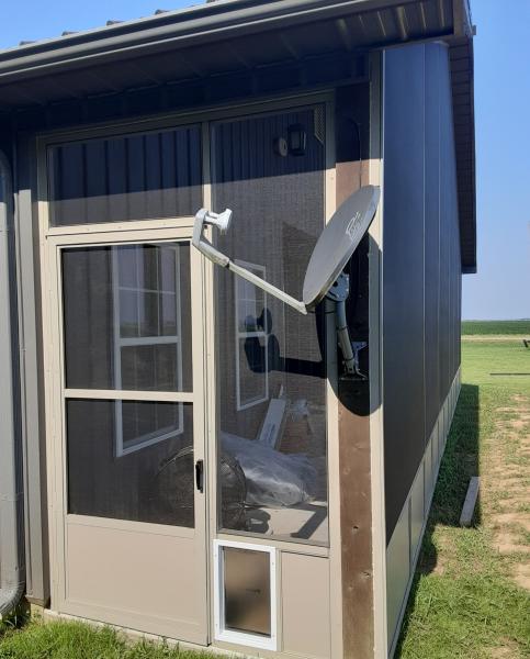 Screen room with dog door